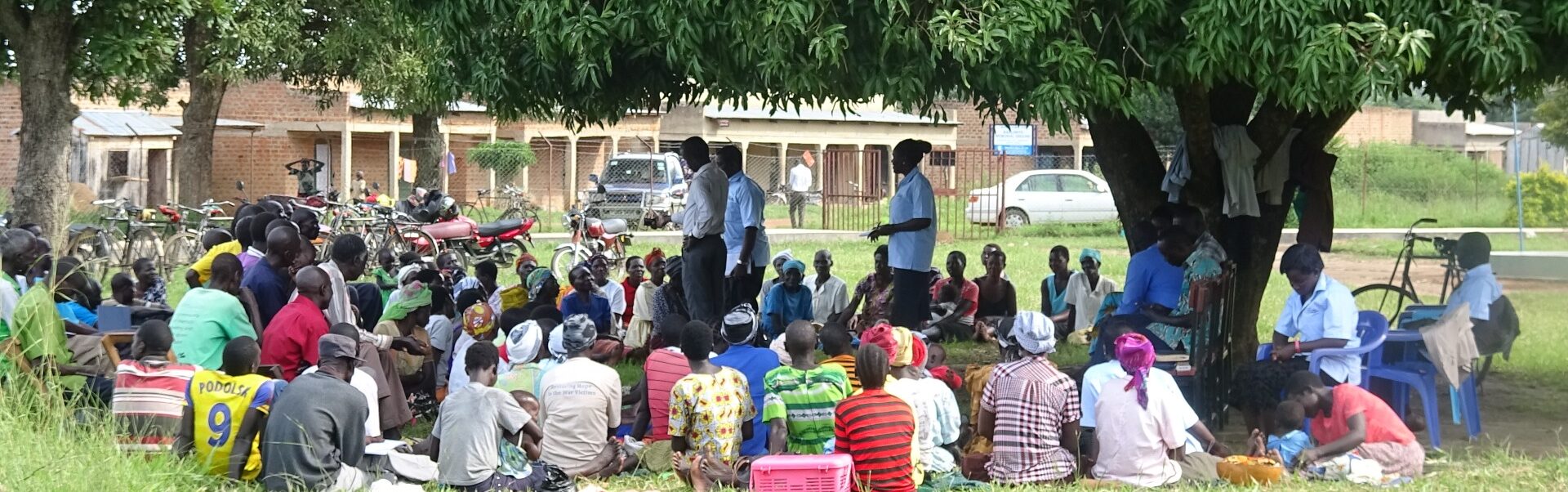 Community meeting under a tree